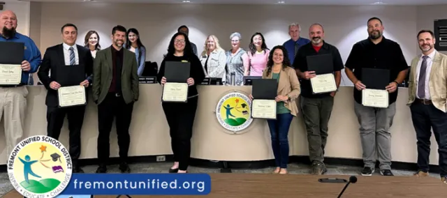 FUSD department heads receiving recognition for the Golden Bell Award 2024.