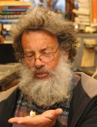 UC Davis distinguished professor Art Shapiro with a cabbage white butterfly, Pieris rapae. (Photo by Kathy Keatley Garvey)