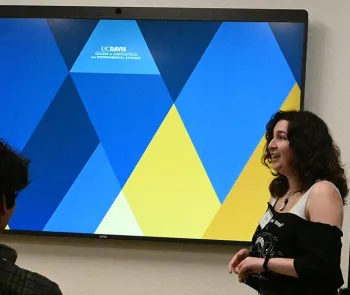 UC Davis student entomologist Sol Wantz delivering her presentation on