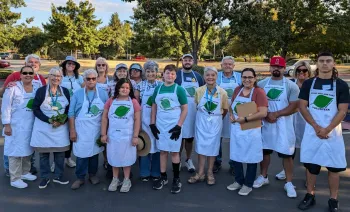 photo of volunteers at grange free plant give and take