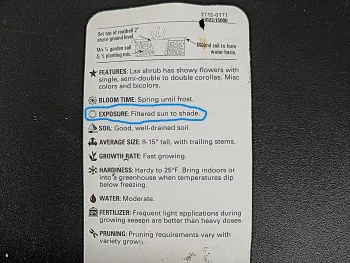 The back of the plant label with the sunlight needs highlighted